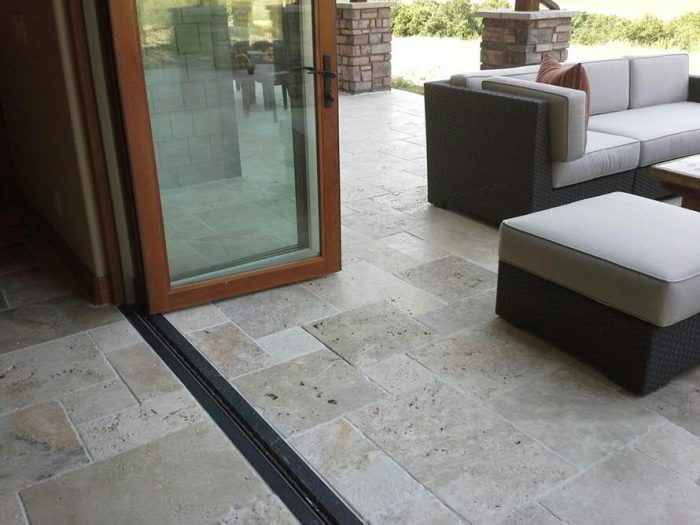Light travertine pavers patio installation Ireland